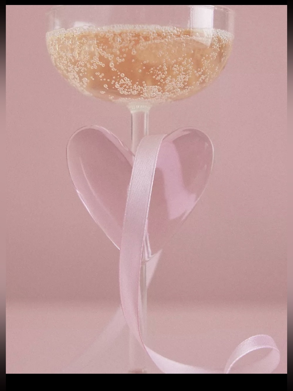 Anthropologie Pink Heart Stem Champagne Glass.